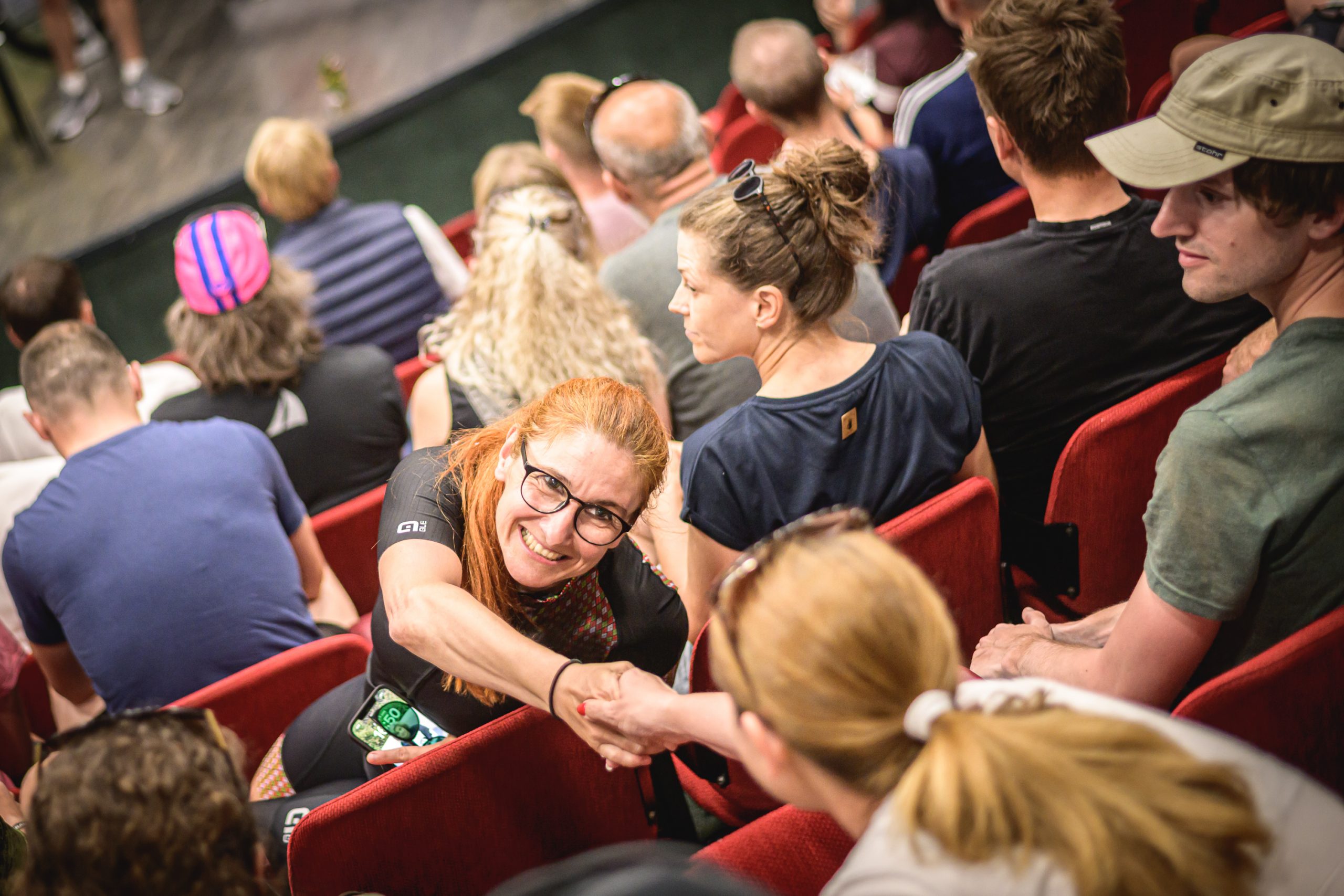 participants shaking hands at rider's briefing